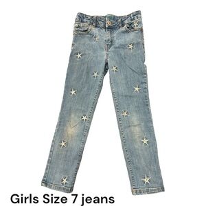 Girls Jeans with some wear at kneees